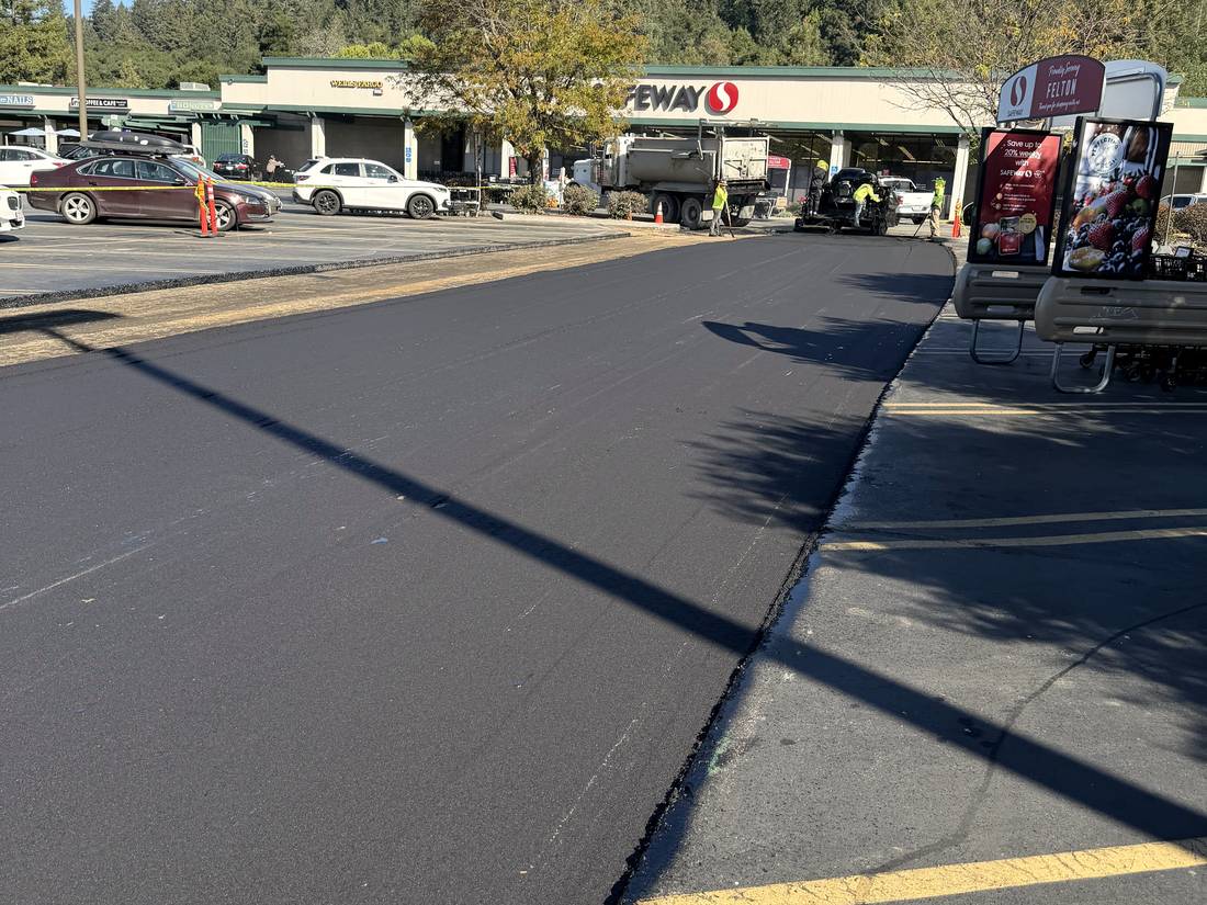 Fresh asphalt mat with a clean edge