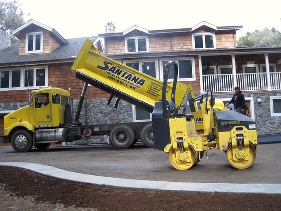 Santana dump truck and roller on a commercial job