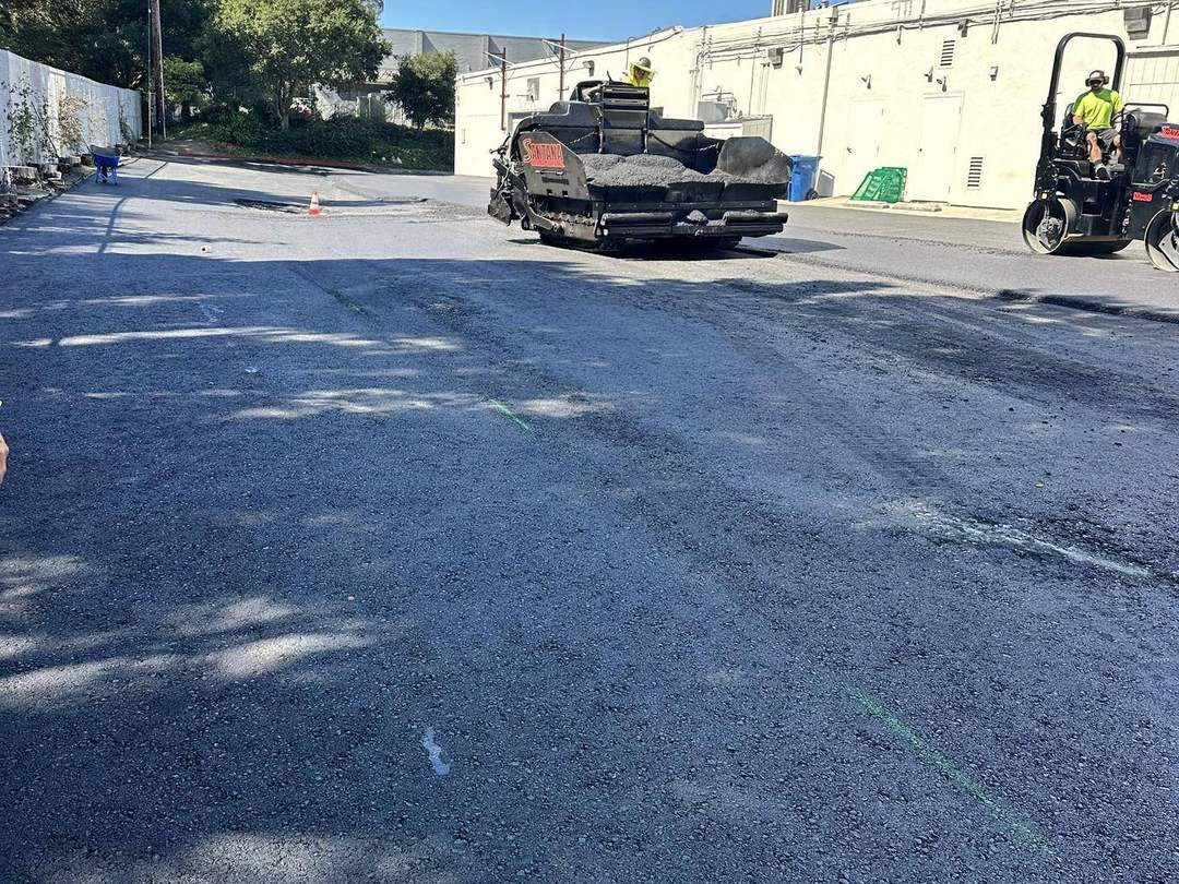 Machine paving in progress