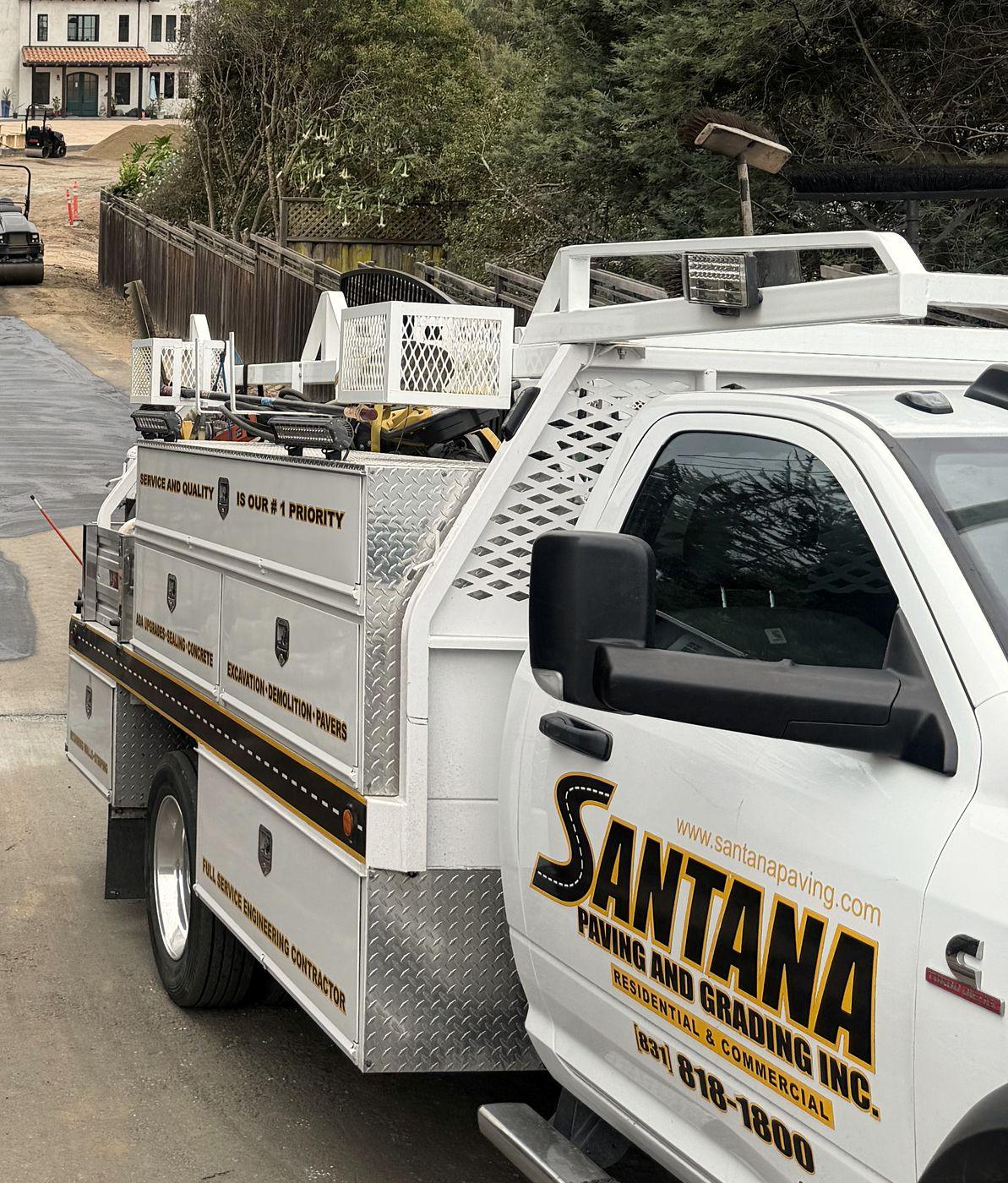 Santana Paving and Grading dump truck on the job